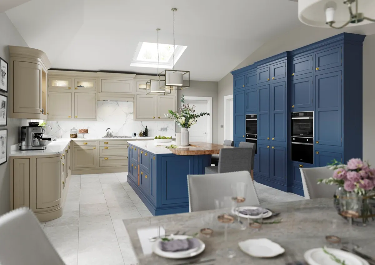 Two-tone shaker kitchen with a navy island and tall navy larder units